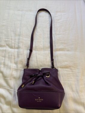 kate spade Deep Plum Pebbled Leather Drawstring Crossbody